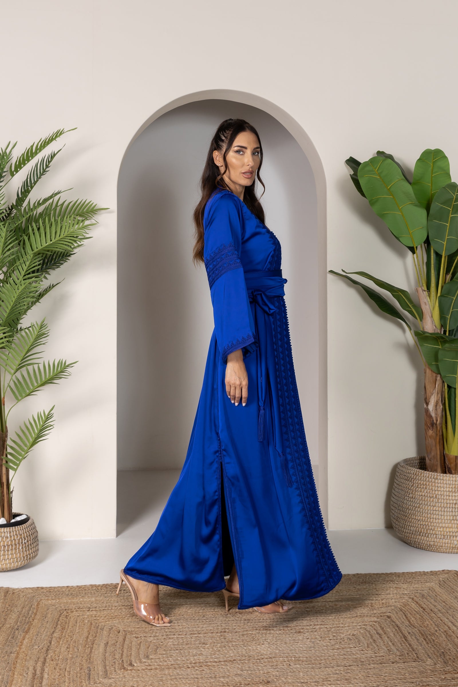 Side view of blue Moroccan kaftan showing elegant design and belt